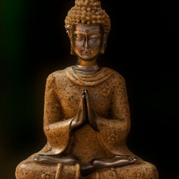 Ancient scroll with symbols representing yoga philosophy.